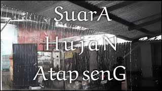 Suara hujan deras diatas atap seng