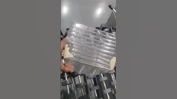 Automatic side sealing and shrink wrapping packaging machine.#machine #shrinkwrappingmachine#packing