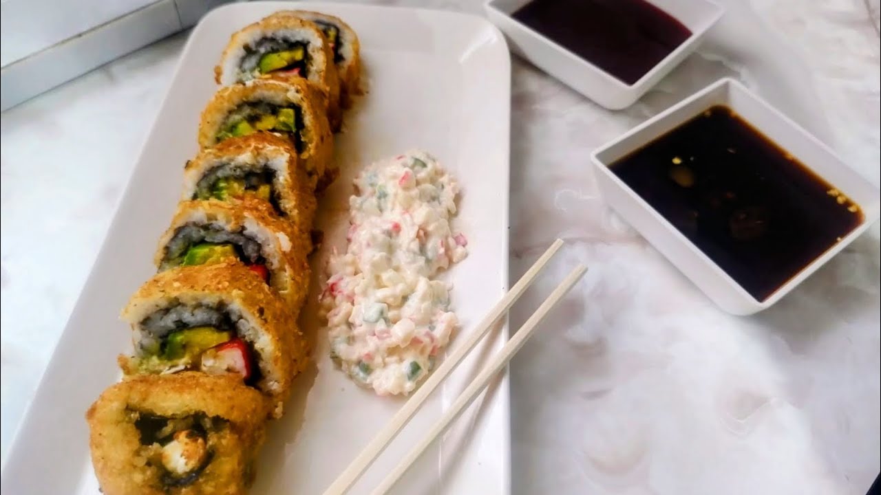 Sushi empanizado, aderezo Tampico, salsa kushiague y soja picante 
