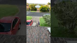 Youngman Throws a Basketball over a House and It Lands into a Hoop