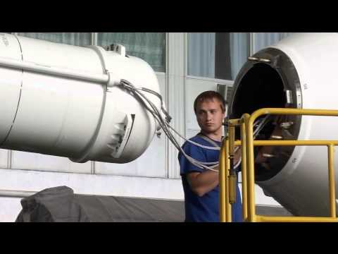 NASA Astronaut and Fellow Crew Members Prepare for Soyuz Rocket Launch