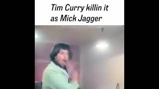 Tim Curry as Mick Jagger