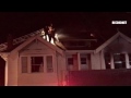 Stockton Fire personnel works on the roof using chainsaw