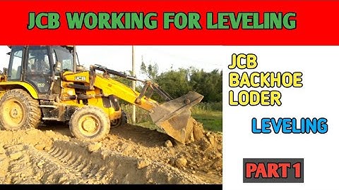 Jcb machine levelling gravel in a road/jcb backhoe working/jcb backhoe levelling / dozer working
