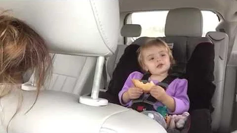 Gabby singing in car