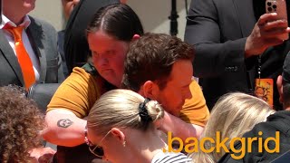 Chris Pratt makes a crying fan happy with a hug at Garfield premiere in Hollywood, CA
