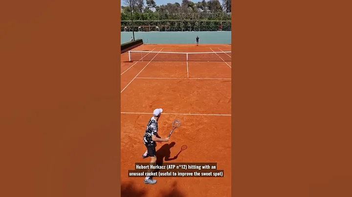 Hubert Hurkacz playing with an unusual tennis rack...