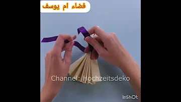 طريقة لف مناديل ورقية للاعراس على شكل فستان 
