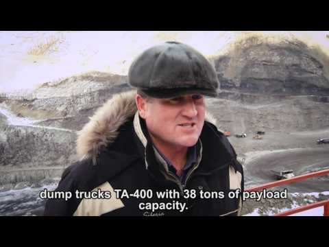 Terex dump trucks haul the coal from highland (English subtitles)