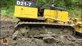 D21-7 Komatsu Mini Dozer Grading Aggregate on a New Road Construction