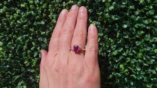 A traditional Ruby and Diamond three stone ring