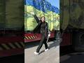 In such a situation, this girl truck driver is not showing her thumb,?