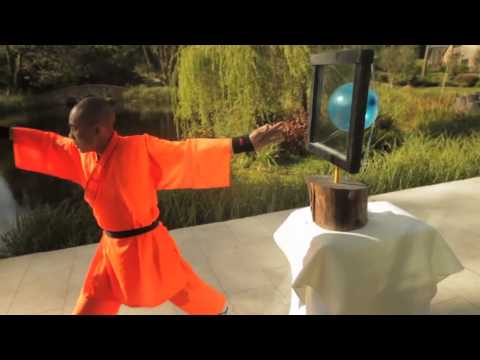 Shaolin Monk Throws Needle Through Glass