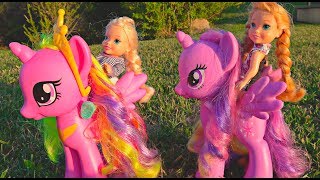 Elsa and Anna toddlers ride their bikes and the ponies adventures with my little pony