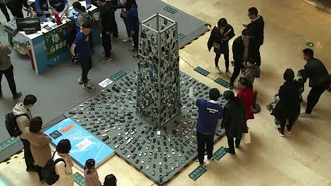 Cell phone 'Tower of Babel' highlights China e-waste problem - 天天要闻