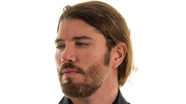 A man looking left and right for verification dl