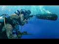 Skilled US Combat Divers in Action During Silent Underwater Assault Training Mission