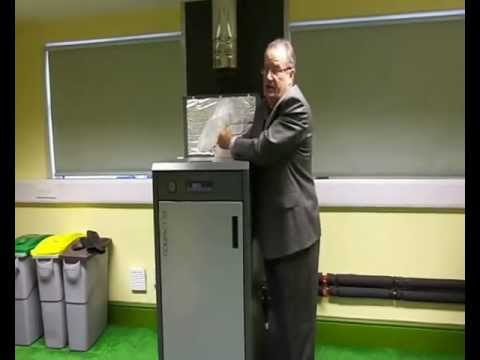 How to fill a biomass boiler - Solarwall Ltd.wmv