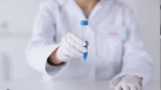 Close Up Of Scientist With Full Beaker In Lab 1 Stock Footage - Envato Elements
