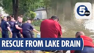 Neighbors rescue three trapped in Medina private lake drain