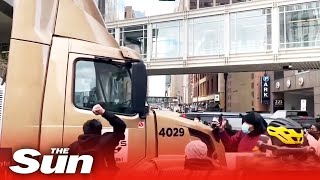 Truck drives through crowds celebrating Derek Chauvin guilty verdict after being surrounded