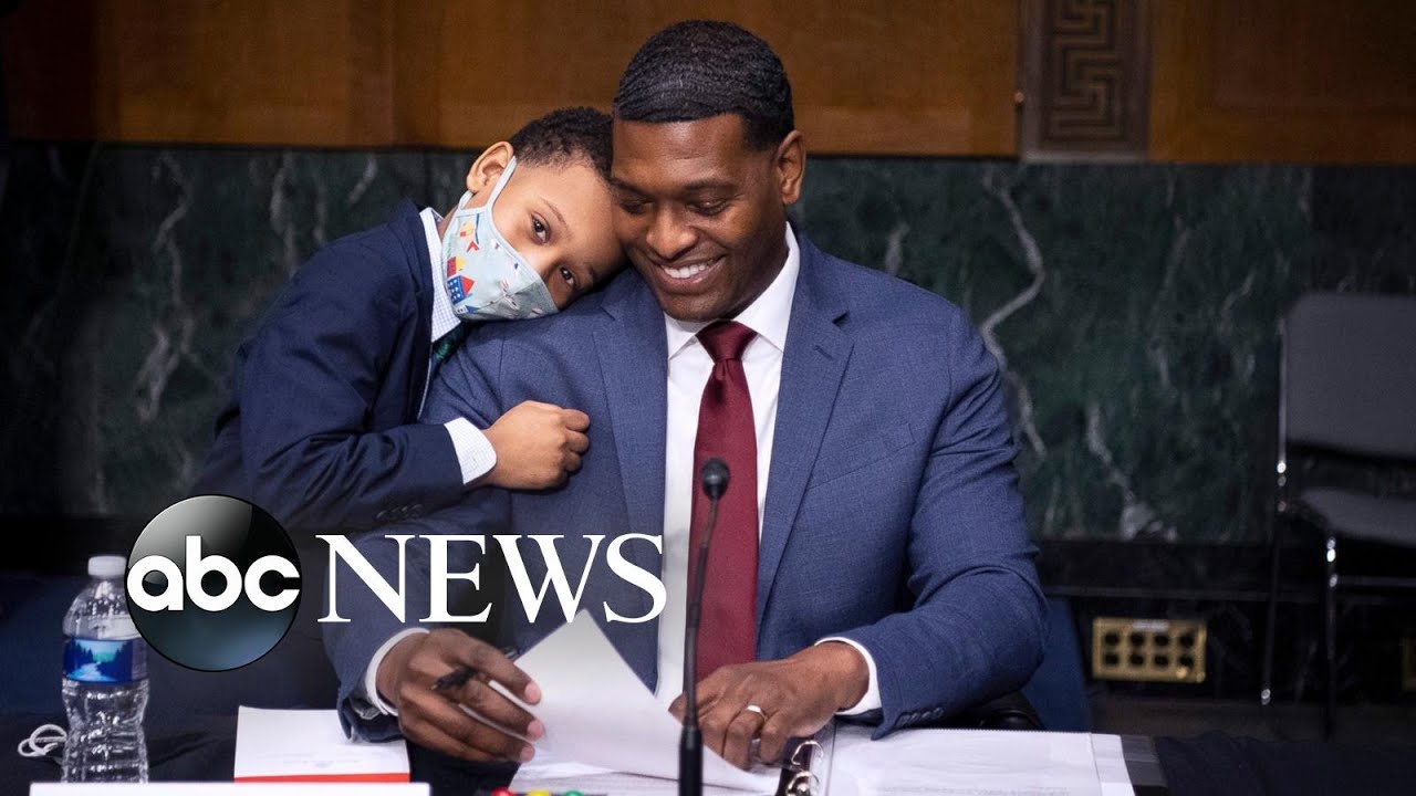 Confirmation hug, bushfires, honoring Captain Tom: World in Photos, Feb. 4