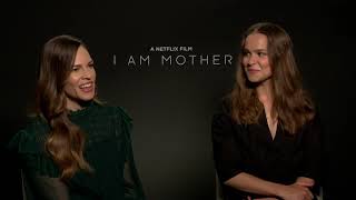 Blackfilm.com Interview with I Am Mother's Hilary Swank, Clara Rugaard & director Grant Sputter