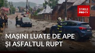 Flash floods tear up asphalt and sweep away cars