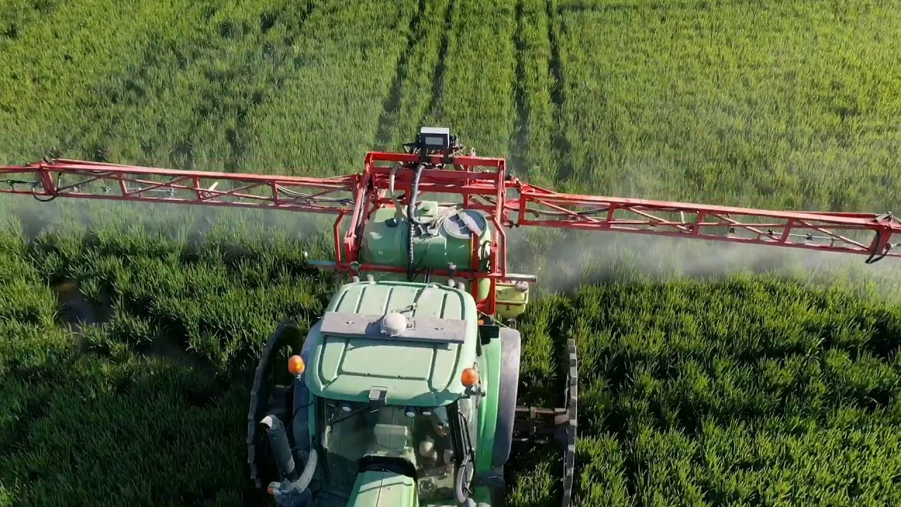 Rice spraying [John Deere 6135M & AMP Sprayer] - YouTube