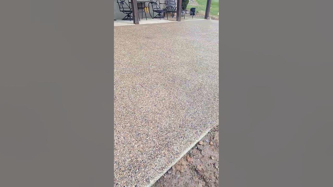 knew exposed aggregate concrete finished with honey brown sealer sigler