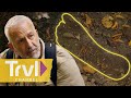 Russell Uncovers Potential Bigfoot Footprint | Expedition Bigfoot | Travel Channel image