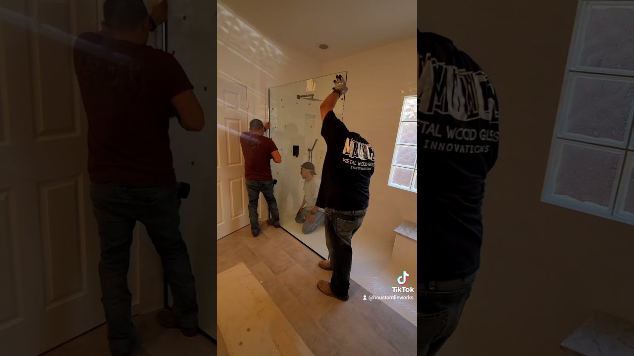 Glass Pannel Installation Day On A Curb Less Shower Pan