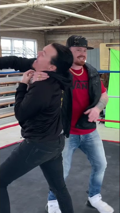 Blacklite District delivers a devastating Chokeslam to drummer Alex Hilton