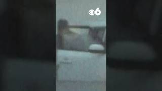 Driver carries child to safety after entering floodwater