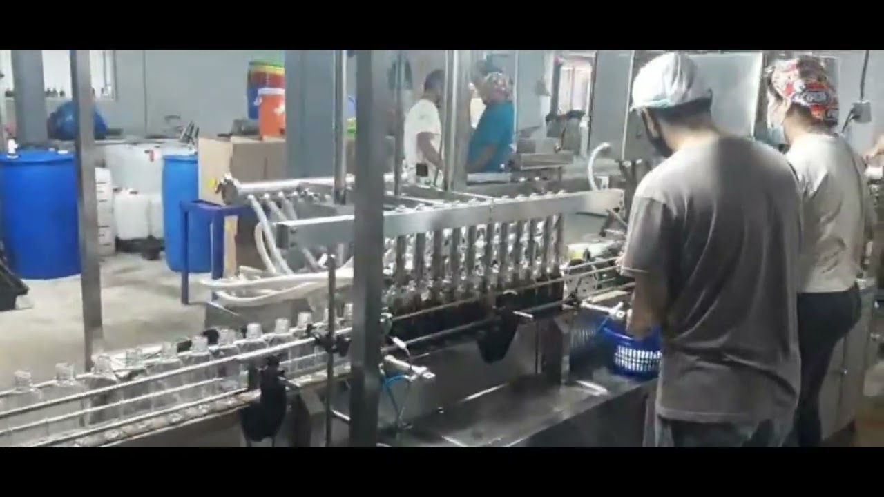 Línea de llenado y taponadora rotativa