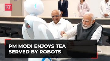 Gujarat: PM Modi enjoys cup of tea served by the robots at Science City, Ahmedabad