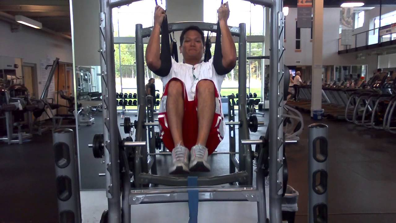 hanging knee raises using ab straps YouTube