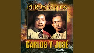 Video thumbnail of "Carlos y Jose - Amores Fingidos"