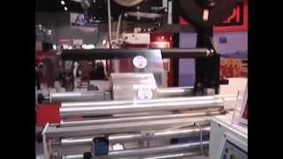 Horizontal Wrapper Labeling System for Cookies, Muffins, Meats.