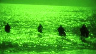 Special Forces Combat Divers Helocast and Surface at Night