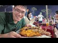 Eating 20 grilled seafood plate in vietnam night market  lobster oysters shrimp clams