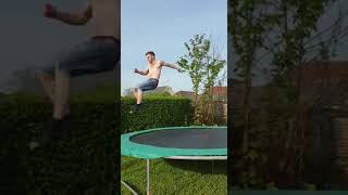 Guy Attempting Double Backflip off Trampoline Falls to Ground - 1040930
