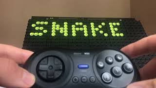 Snake and bricks game on a flipdot display screenshot 3