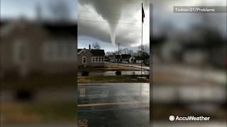 Large tornado looms ominously overhead