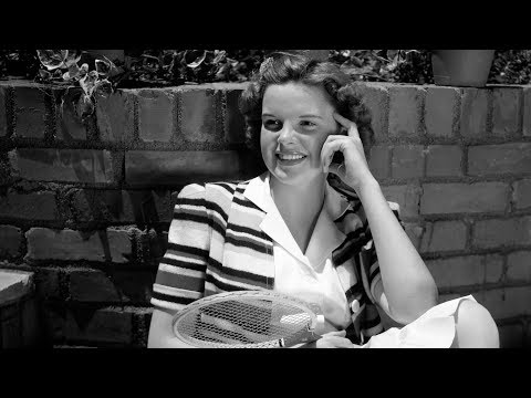 A powerhouse packed into a 4' 11" (151 cm) frame, Judy Garland shot to stardom at 17 with "The Wizard of Oz". She and Mickey Rooney went on to star in 9 movies aimed at teen audience. The cute little girl in this video is her daughter Liza Minnelli. Ms. Garland's tumultuous life with drugs is well documented, and at the age of 47 she died of drug overdose. The soundtrack, "You Go To My Head" by Judy Garland, is a live recording at Carnegie Hall in 1961. NOTE: Since it's a live recording, if you listen closely, Ms. Garland forgot the lyrics about 57 seconds into the video, and, in a hilarious ad-lib, sang "with...and I forgot the god-darn words...(garbled)." The actual lyrics, which she later remembered, are "with a smile that makes my temperature rise, like a summer with a thousand Julys." NOTE 8/30/09: I've created a new channel called "SundroidHD", focusing on HD videos. Here is the link: www.youtube.com