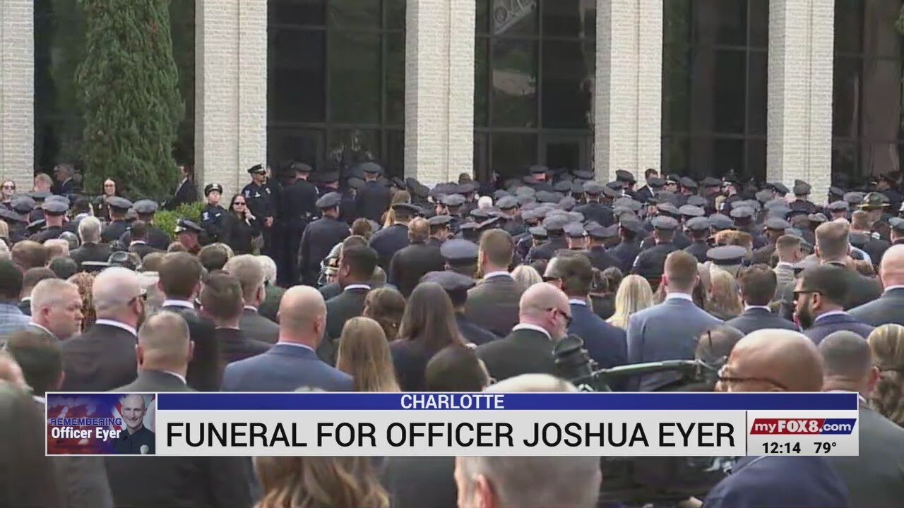 Triad law enforcement attending funeral for fallen CMPD officer - YouTube