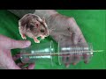 Испытание ловушки для мыши "Сожми 2 стаканчика"
