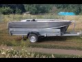 Лодка Wyatboat 390P и прицеп для её перевозки .