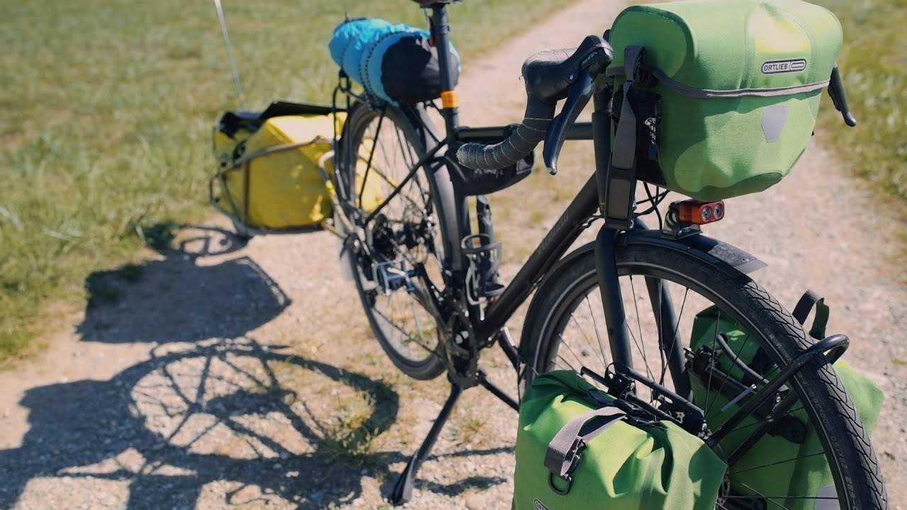 Choix entre sacoches et remorques