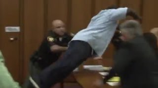 Dad Jumps Over Table To Attack Daughter's Killer in Court